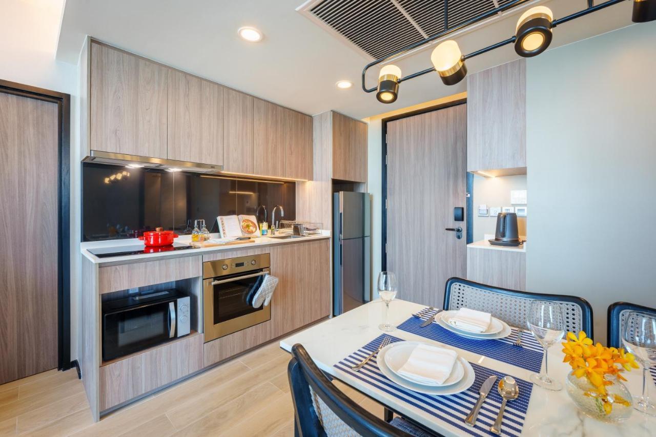 Somerset Pattaya Extérieur photo A kitchen in a serviced apartment in Singapore
